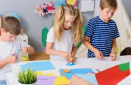 Children creating arts and crafts